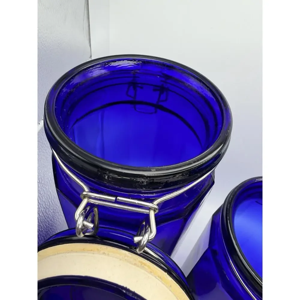 Vintage (4) SET FOUR Canister Jars Cobalt Blue Glass 12-Panel w/ Wire Bale Lid